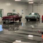 Car garage with metallic epoxy floor coating